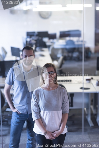 Image of business couple at office