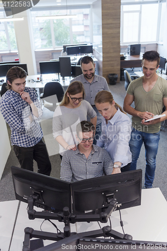 Image of startup business people group working as team to find solution