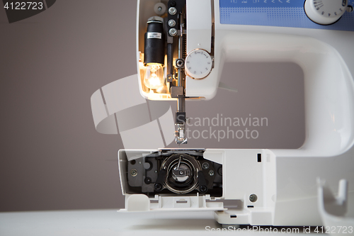 Image of Sewing machine with open spool