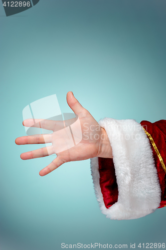 Image of Photo of Santa Claus hand in pointing gesture