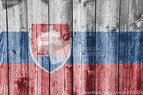 Image of Flag of Slovakia on weathered wood