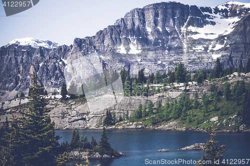 Image of Large mountain by an idyllic lake