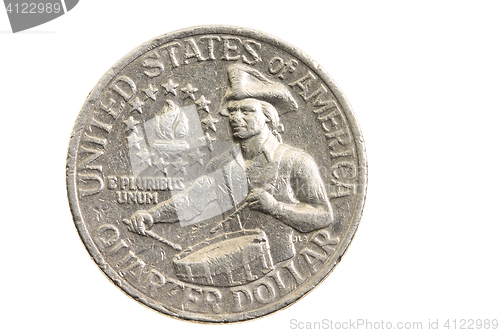 Image of coin in a quarter of the US dollar