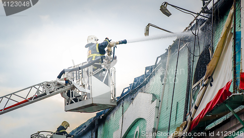 Image of Firefighters in action fighting fire