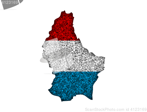 Image of Map and flag of Luxembourg on poppy seeds