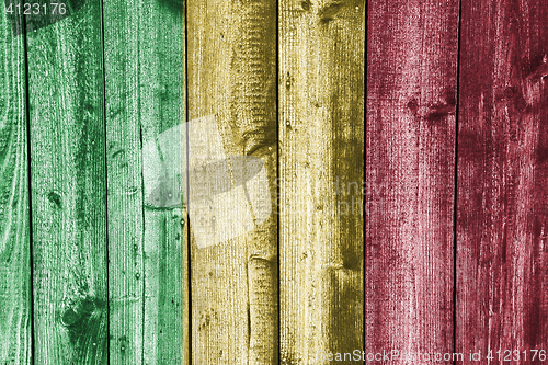 Image of Flag of Mali on weathered wood