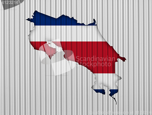 Image of Map and flag of Costa Rica on corrugated iron