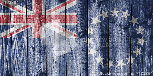 Image of Flag of the Cook Islands on weathered wood
