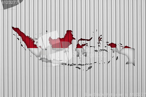 Image of Map and flag of Indonesia on corrugated iron