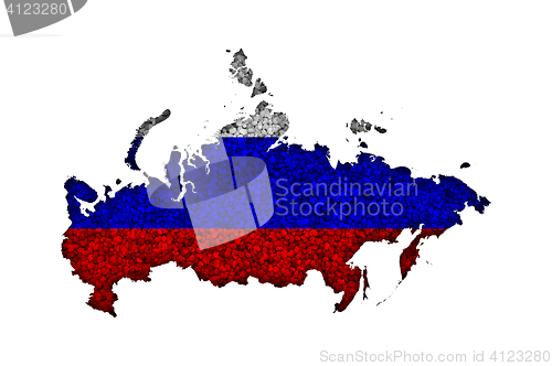 Image of Map and flag of Russia on poppy seeds