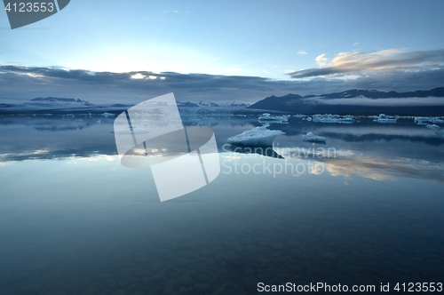 Image of Icelandic glacial lake with mountains.