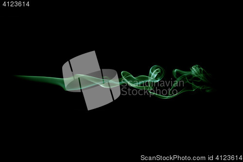 Image of Green smoke wave isolated on white. Green smoke trail isolated on white. Horizontal wave.