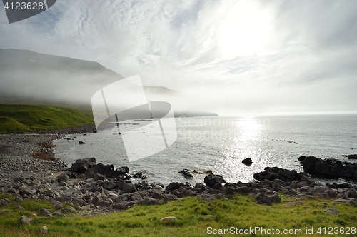 Image of Icelandic coast with mountains