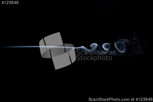 Image of Smoke wave isolated on black. Smoke trail isolated on black. Horizontal smoke wave.