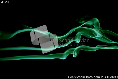 Image of Abstract green waves isolated on black