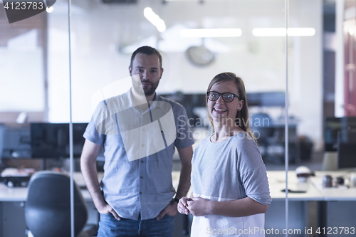 Image of business couple at office