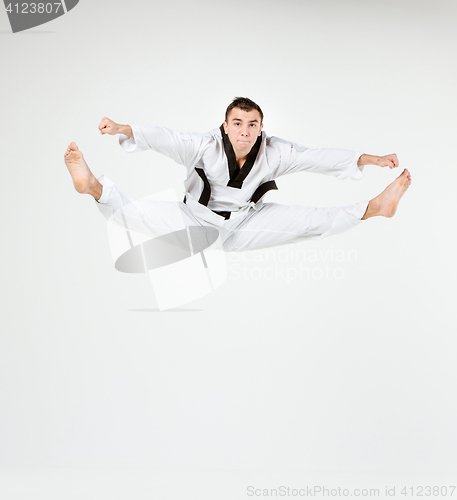 Image of The karate man with black belt