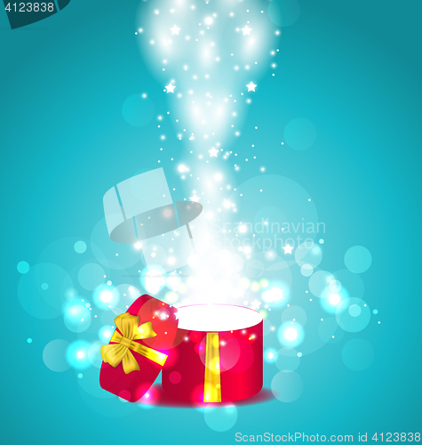 Image of Christmas glowing background with open round gift box