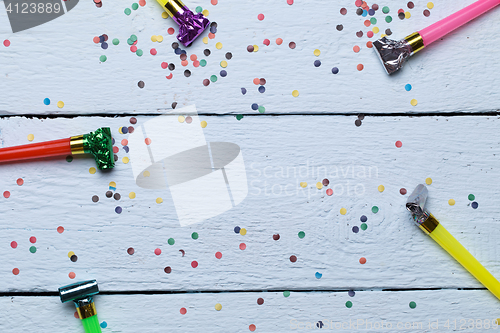 Image of Confetti, photo on wooden floor