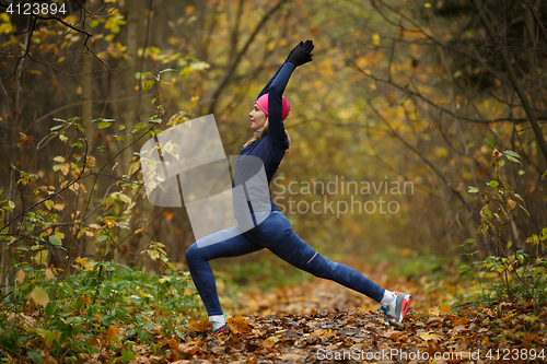 Image of Girl at gym in forest