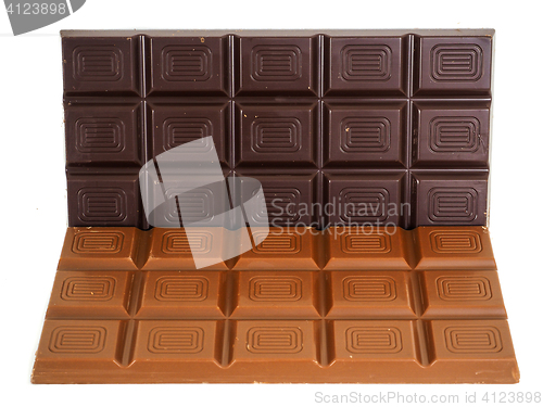Image of Person holding a whole bar of dark chocolate isolated towards wh