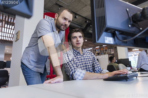 Image of startup business people group working as team to find solution