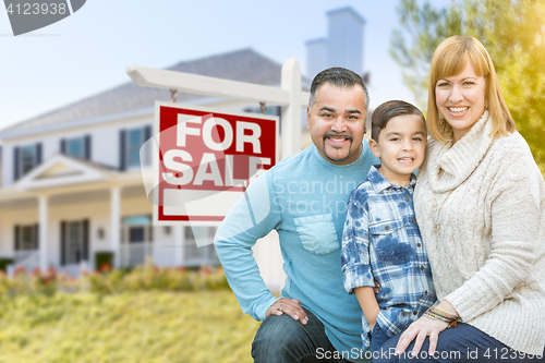 Image of Mixed Race Family Portrait In Front of House and For Sale Real E