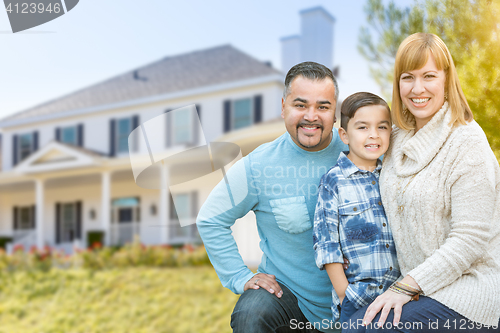 Image of Mixed Race Family Portrait In Front of House