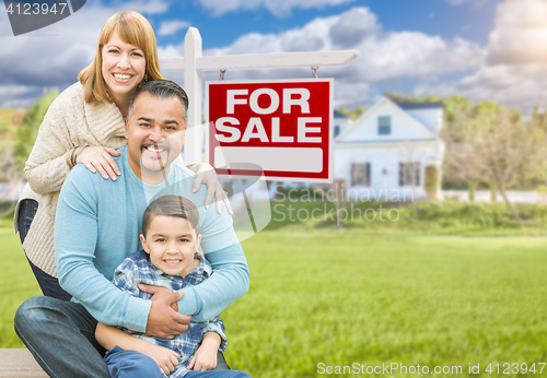 Image of Mixed Race Family Portrait In Front of House and For Sale Real E