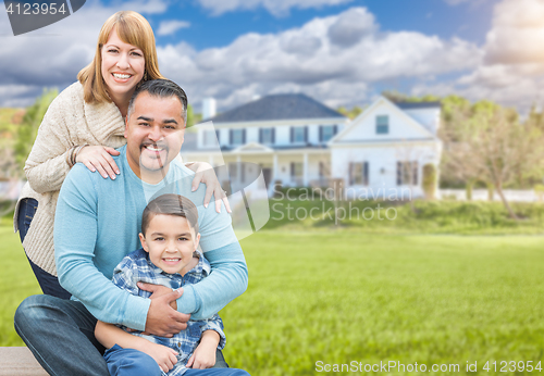 Image of Mixed Race Family Portrait In Front of House