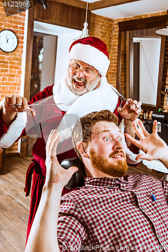 Image of Santa claus as master at barber shop