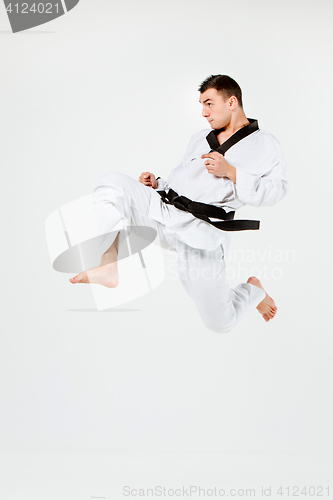 Image of The karate man with black belt