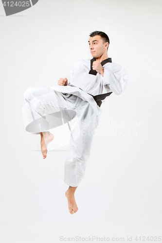 Image of The karate man with black belt