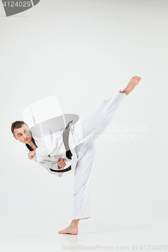 Image of The karate man with black belt