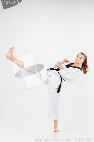 Image of The karate girl with black belt