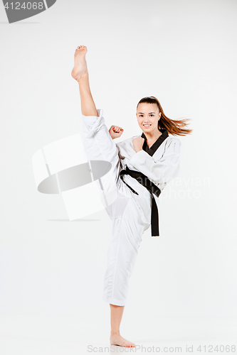 Image of The karate girl with black belt