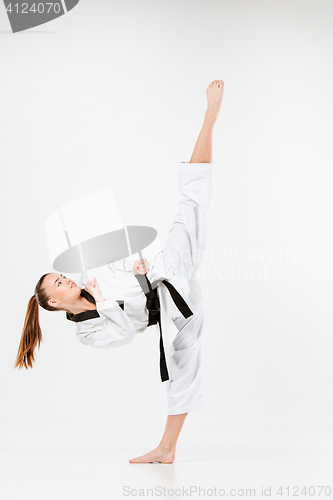 Image of The karate girl with black belt