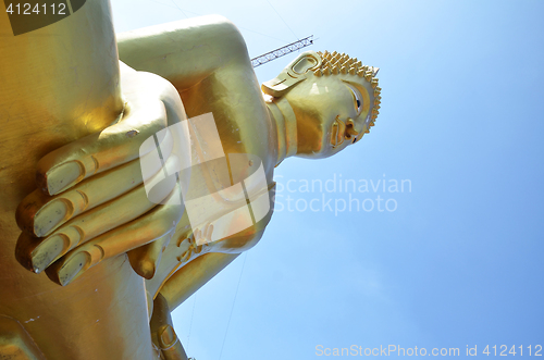 Image of Golden Buddha statue of Big Buddha over blue sky