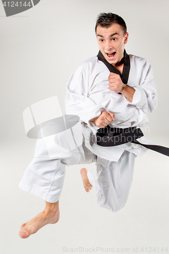 Image of The karate man with black belt