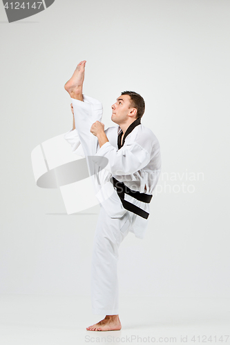 Image of The karate man with black belt