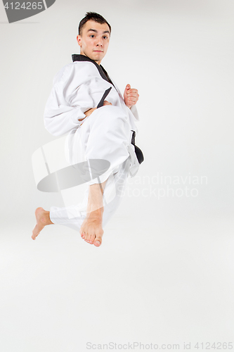 Image of The karate man with black belt