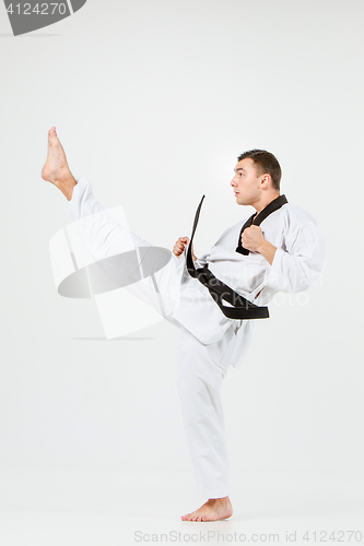 Image of The karate man with black belt