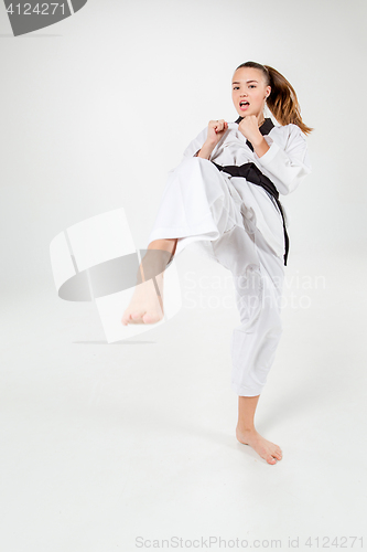 Image of The karate girl with black belt