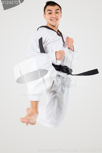 Image of The karate man with black belt