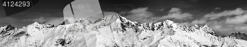 Image of Large panoramic view on snowy mountains in sunny day