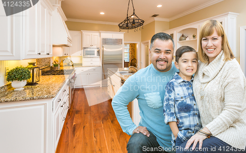 Image of Young Mixed Race Family Having Fun in Custom Kitchen