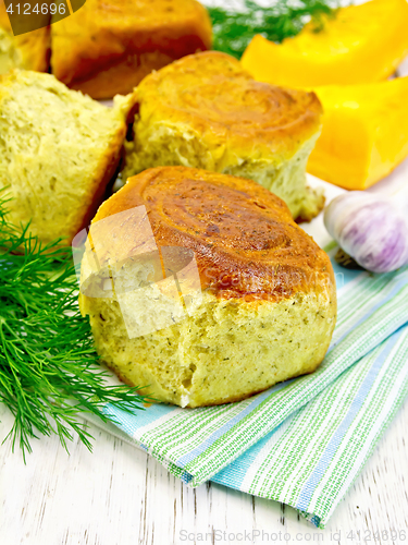 Image of Scones pumpkin with garlic and dill on towel