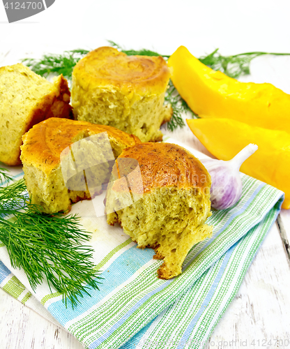 Image of Scones pumpkin with garlic and dill on light board