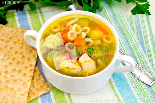 Image of Soup Minestrone in bowl on towel