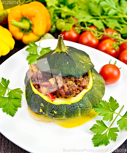 Image of Squash green stuffed with meat on board